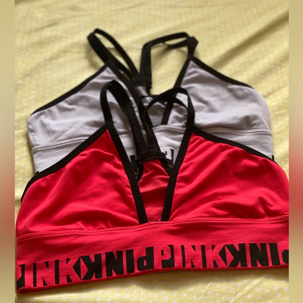 Women Pink yoga by Victoria Secret sports bra of 2 size M.